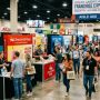 Visitors exploring franchise brand booths at the Great American Franchise Expo in Dallas, Texas, in October 2026